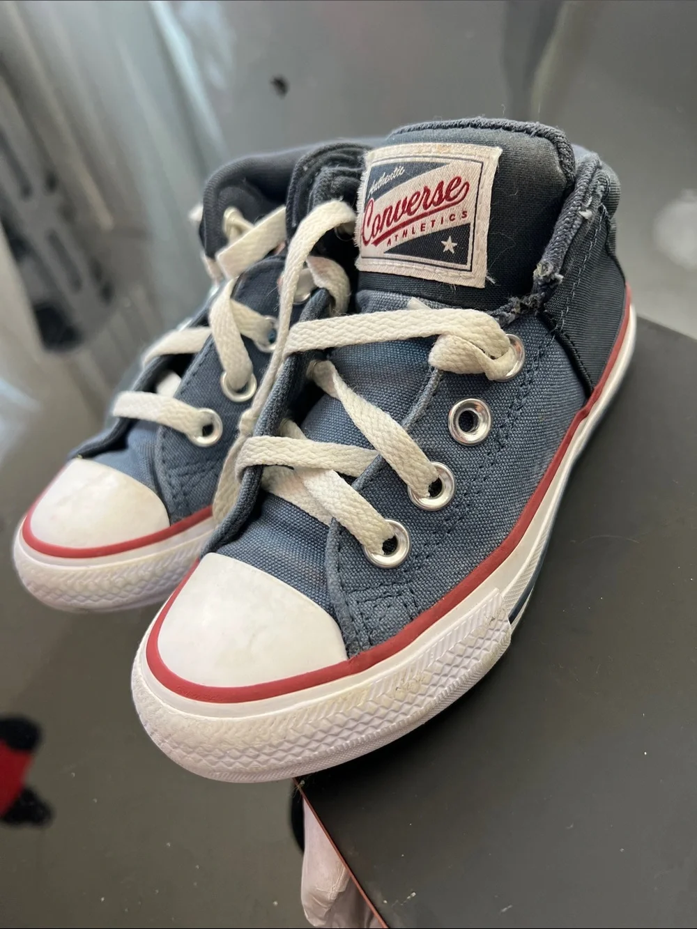 Converse Low-Top Sneakers in Blue, Black and White with Red Trim